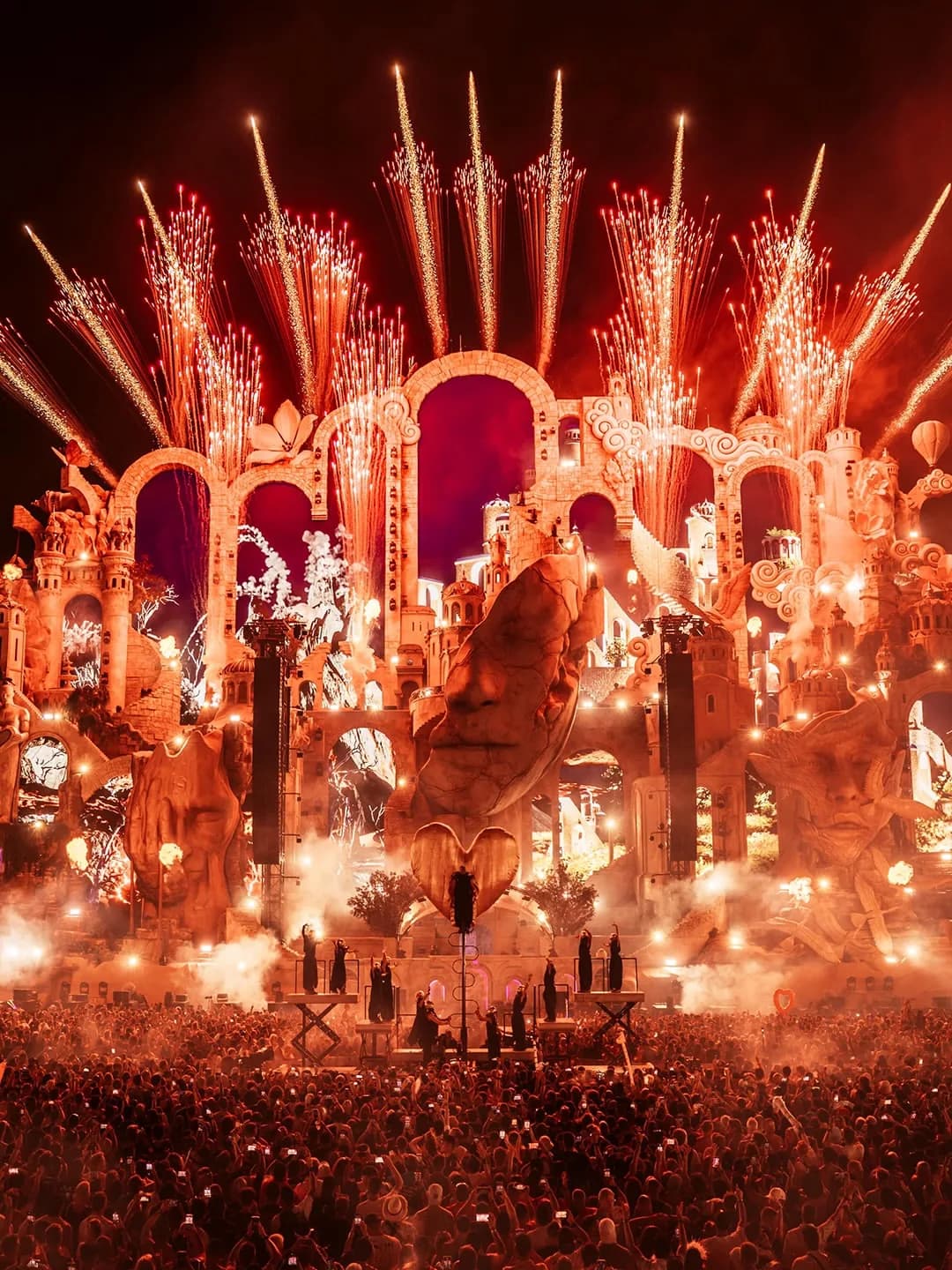 The Tomorrowland mainstage lit by pyrotechnics at night